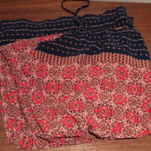 Red jumpsuit with pockets.